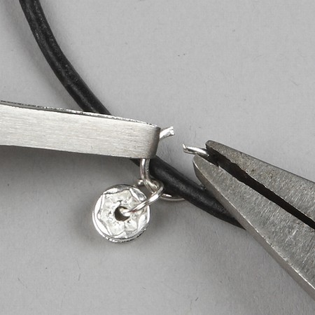 A Leather Cord with Wire Beads