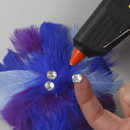 A Hair Band with a Feather Flower