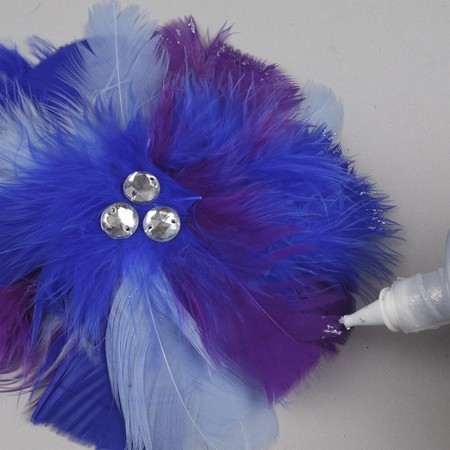 A Hair Band with a Feather Flower