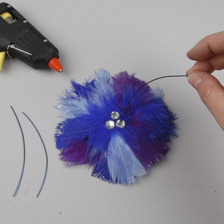 A Hair Band with a Feather Flower