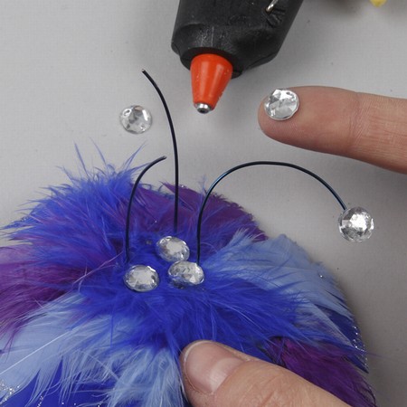 A Hair Band with a Feather Flower